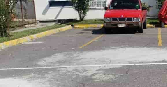 Fotografía real de un Estacionamiento que puedes rentar con SpotMe) de forma rápida y segura, ubicado en 5 de Diciembre, CDMX.