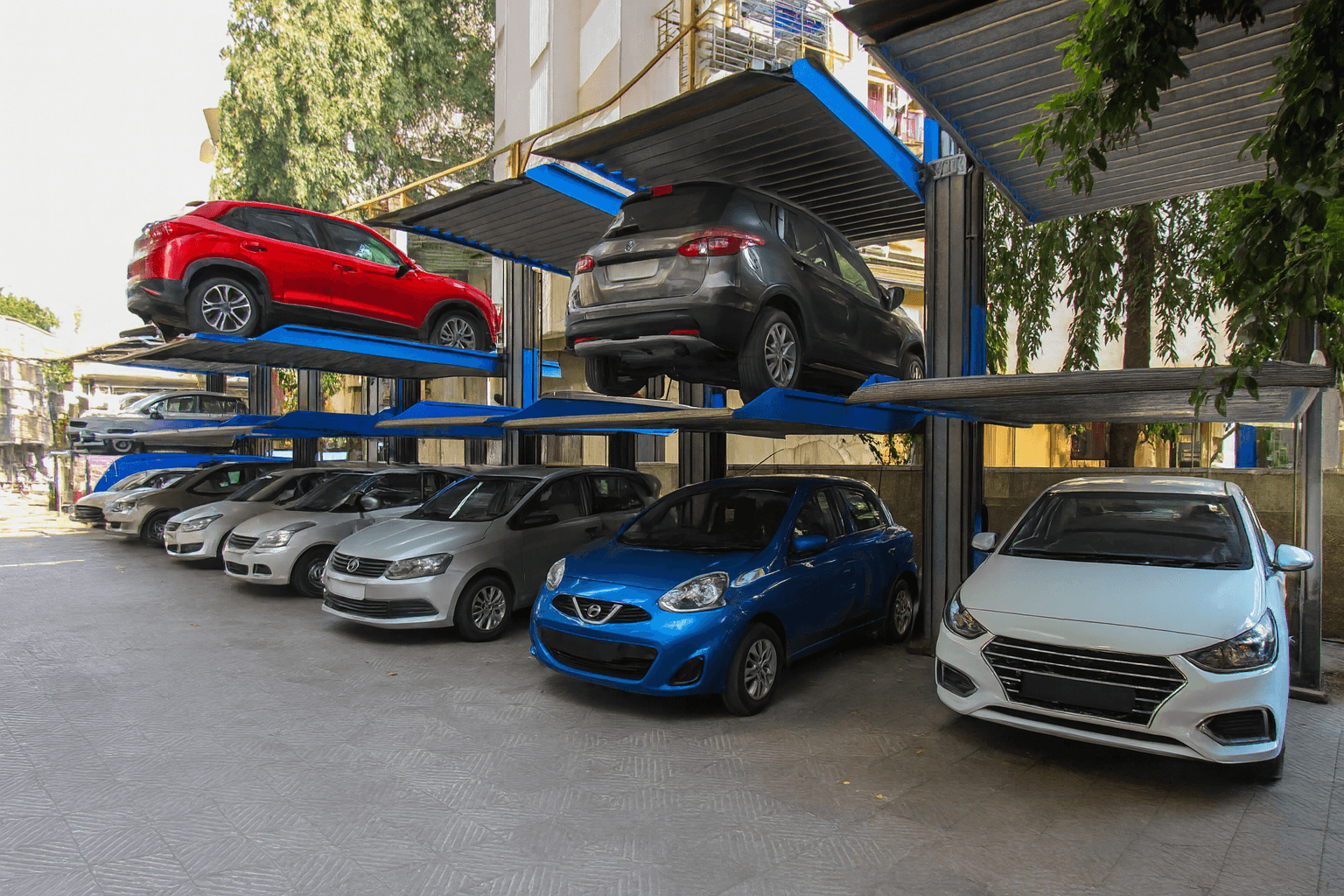 Monthly parking in Mexico City with cars parked safely in a blue SpotMe lot