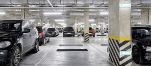 A sedan parked in someone's parking space rented through a parking rental app like SpotMe. SpotMe connects those looking to generate passive income by renting out their parking space with users in need of parking spaces to rent.